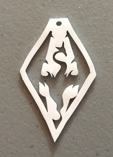 Misshapen shrink plastic Akatosh pendant