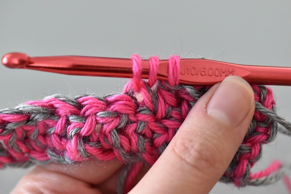 Yarn over pull up loop with pink