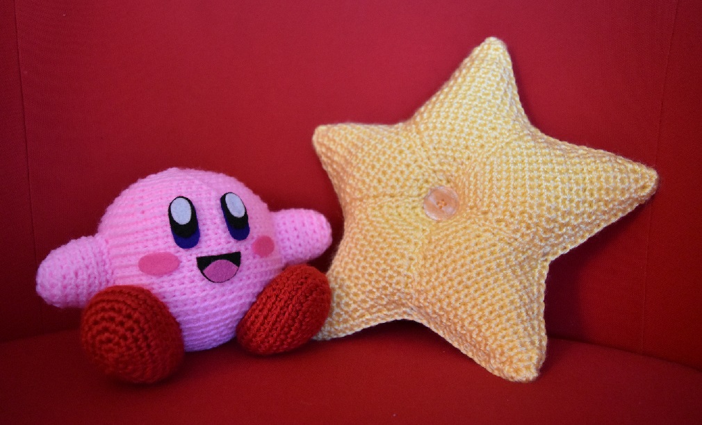 Amigurumi Kirby with crocheted star pillow
